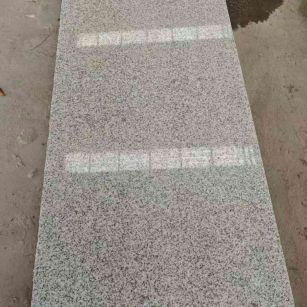 广州芝麻白光面毛板