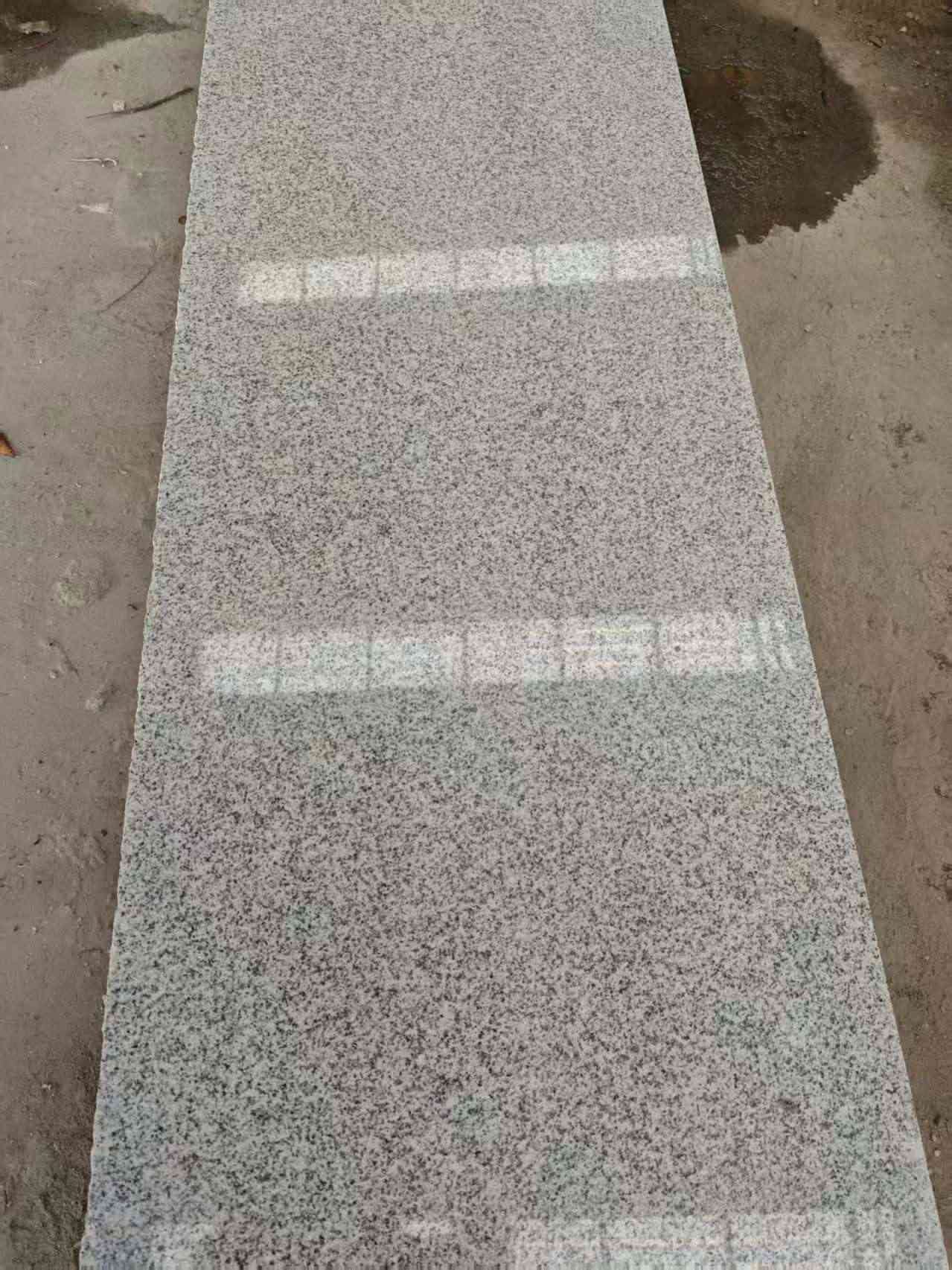 广州芝麻白光面毛板